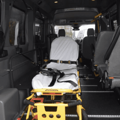 Empty stretcher inside an ambulance ready for patient transport.